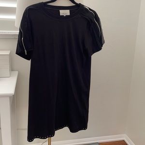 Black t shirt dress with embellishments.